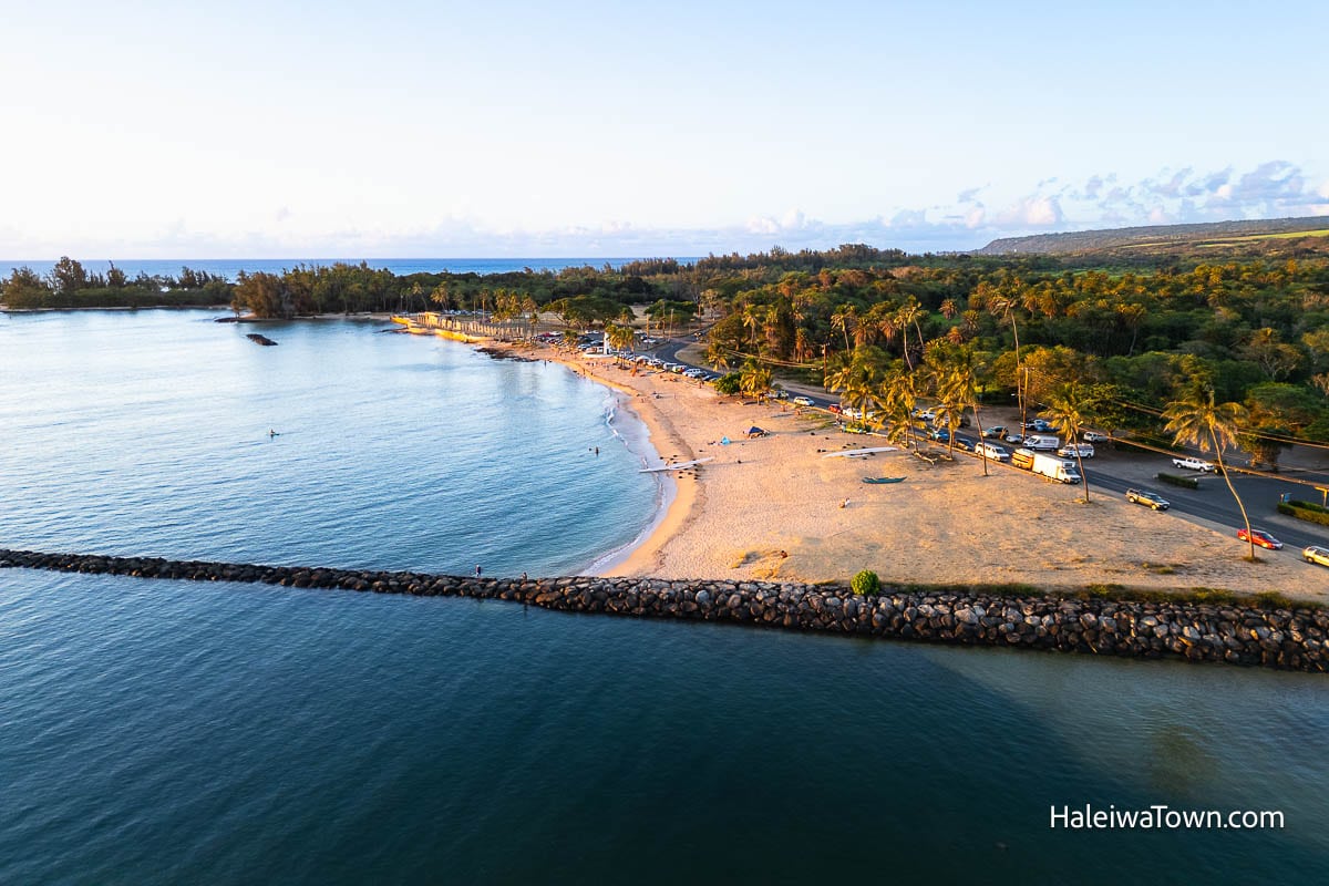 aerial view of haleiwa beach park and puaena point during sunset hours