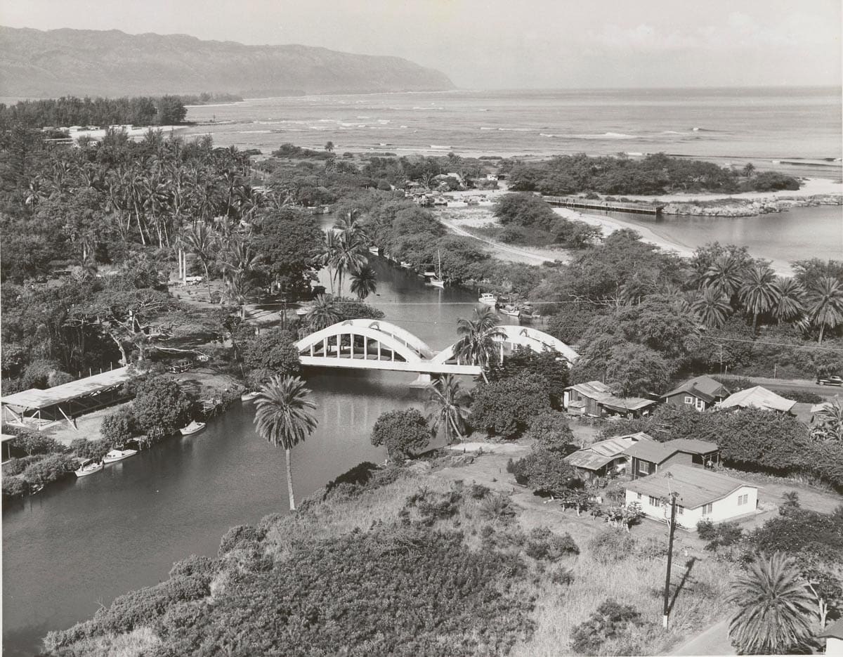 black and white historic aerial view of haleiwa anahulu stream ocean mountain houses and rainbow bridge