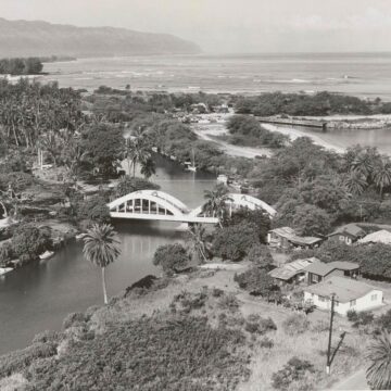 black and white aerial view of haleiwa anahulu stream ocean mountain and rainbow bridge