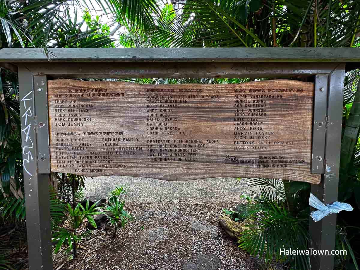 Memorial sign honoring surfers and lifeguards at Pipeline