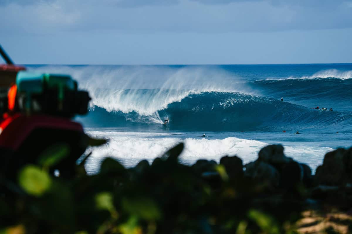 surfer in a barrel at Pipeline from Ehukai Beach Park
